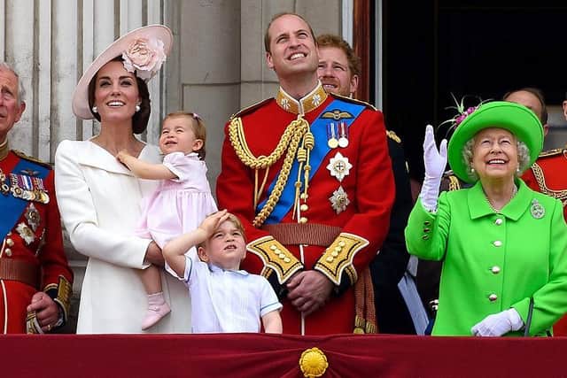 LONDON, ENGLAND - JUNE 11: (L-R) Prince Charles, Prince of Wales, Catherine, Duchess of Cambridge, Princess Charlotte, Prince George, Prince William, Duke of Cambridge, Prince Harry, Queen Elizabeth II and Prince Philip, Duke of Edinburgh stand on the balcony during the Trooping the Colour, this year marking the Queen's 90th birthday at The Mall on June 11, 2016 in London, England. The ceremony is Queen Elizabeth II's annual birthday parade and dates back to the time of Charles II in the 17th Century when the Colours of a regiment were used as a rallying point in battle. (Photo by Ben A. Pruchnie/Getty Images)