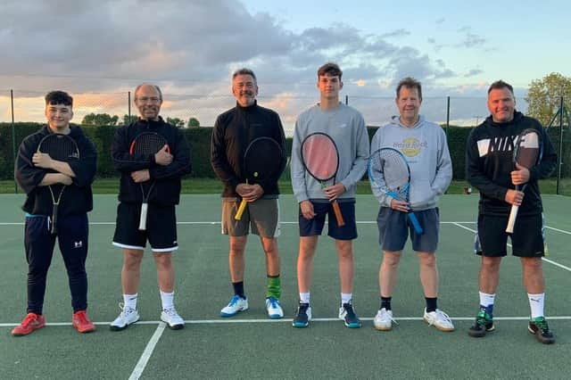 members of the victorious men's team.