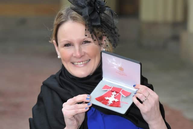 Claire Lomas, pictured after receiving her MBE from the Duke of Cambridge on February 28, 2017 in London (Photo by Nick Ansell - WPA Pool/Getty Images)