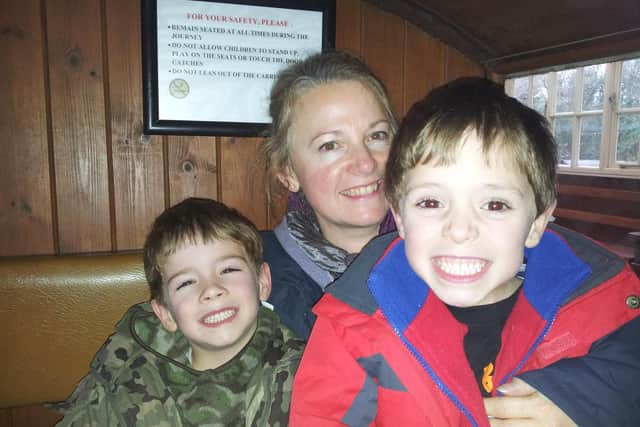 Linda Marshall who tragically died following a cardiac arrest at the end of last year, pictured with her twin sons, Max and Harrison