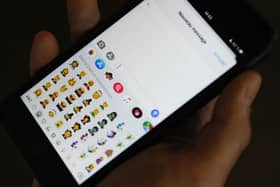 Apple could bring AI generated emojis to iPhones! (Picture: Tengku Bahar/AFP via Getty Images)
