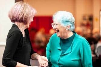 Members enjoying a quick chat at a u3a meeting