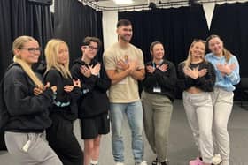Owen Warner pictured with performing arts students on his return to SMB College Group's Melton campus