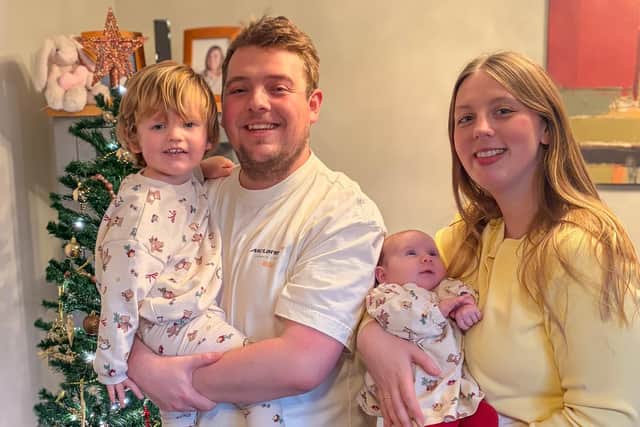Joel and Hannah, with their children, Archie and Florence