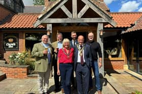 Edward Argar MP and other dignitaries at the reopening today of The Crown at Old Dalby