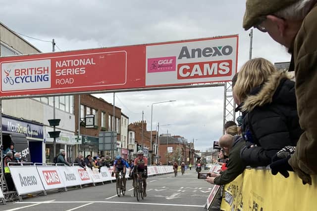 Jessica Finney roars with delight as she wins the sprint finish in today's ANEXO/CAMS Women's CiCLE Classic in Sherrard Street, Melton