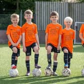 Asfordby Under 7s Avengers in their kit sponsored by David Wilson Homes East Midlands