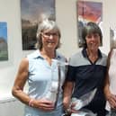 The winning team of Denise Waldron, Lesley Twigg and Maureen McCall are pictured with Lady Captain Joan Allen.