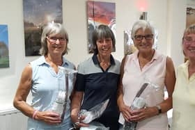 The winning team of Denise Waldron, Lesley Twigg and Maureen McCall are pictured with Lady Captain Joan Allen.