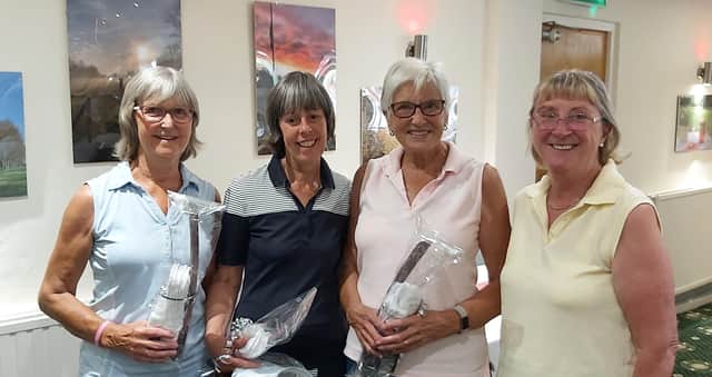 The winning team of Denise Waldron, Lesley Twigg and Maureen McCall are pictured with Lady Captain Joan Allen.
