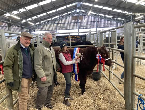 11-year-old Isabel Stephen with her winner in the The Best Beast Shown by a Young Handler at the 2023 Melton Christmas Fatstock Show, with Mayor Alan Hewson and Hugh Brown (MBAS)