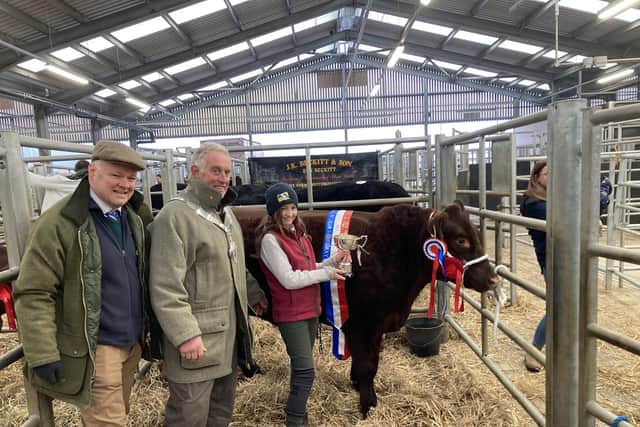 11-year-old Isabel Stephen with her winner in the The Best Beast Shown by a Young Handler at the 2023 Melton Christmas Fatstock Show, with Mayor Alan Hewson and Hugh Brown (MBAS)