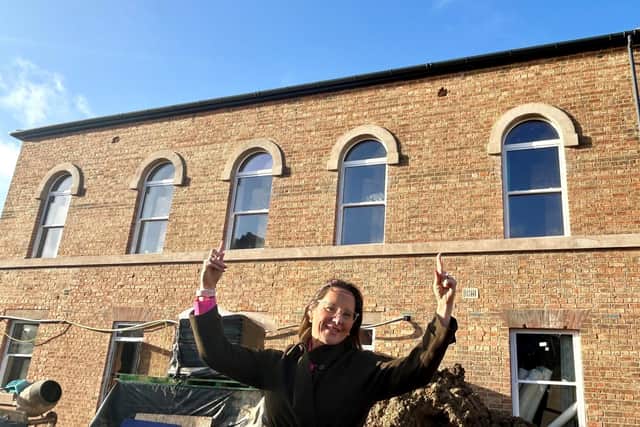 Sara Wilson-Wright, of Newton Fallowell, at the former Melton Mowbray workhouse which has been converted into eight new homes