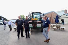 Andy Eadon stops off at Melton Livestock Market during his 2,000-mile Len's Light tractor relay