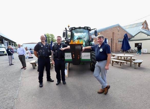 Andy Eadon stops off at Melton Livestock Market during his 2,000-mile Len's Light tractor relay