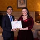 Rutland and Melton MP Alicia Kearns presents her Christmas card - designed by local schoolchildren following a competition - to Prime Minister, Rishi Sunak