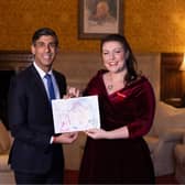 Rutland and Melton MP Alicia Kearns presents her Christmas card - designed by local schoolchildren following a competition - to Prime Minister, Rishi Sunak