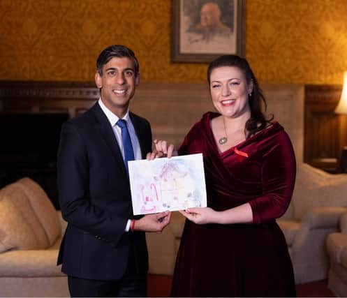 Rutland and Melton MP Alicia Kearns presents her Christmas card - designed by local schoolchildren following a competition - to Prime Minister, Rishi Sunak