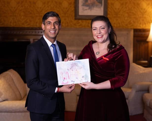 Rutland and Melton MP Alicia Kearns presents her Christmas card - designed by local schoolchildren following a competition - to Prime Minister, Rishi Sunak