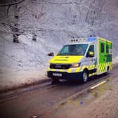 An ambulance in wintry conditions