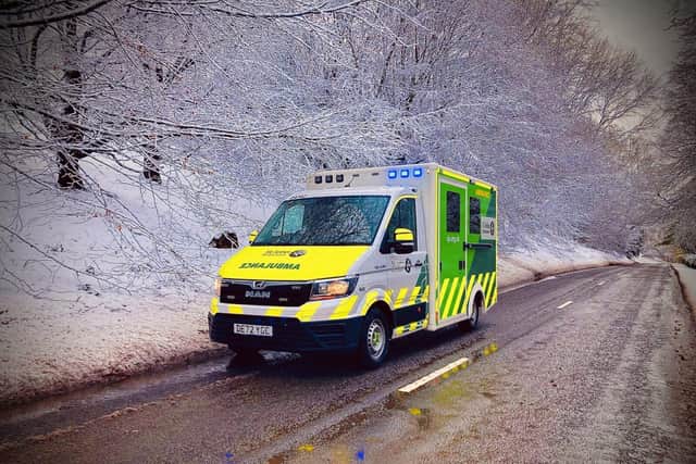 An ambulance in wintry conditions