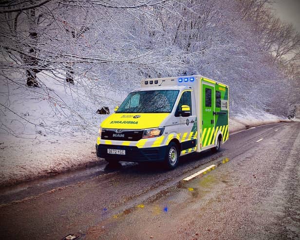 An ambulance in wintry conditions
