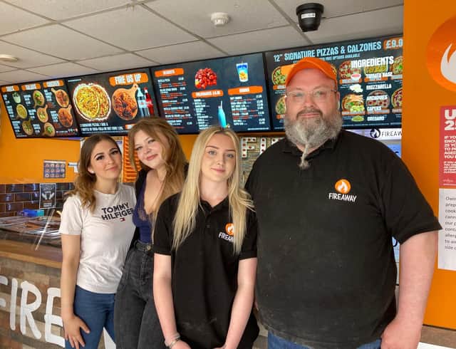 Manager, Leigh Wicks, with some of the staff at Melton's Fireaway Designer Pizza restaurant