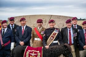 Serving personnel with veterans at the Friends of the Tenth memorial in Burrough-on-the-Hill during the annual service earlier this month IMAGE: The Parachute Regiment