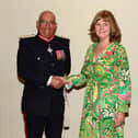 Dove Cottage Day Hospice founder Christine Gatfield receives her British Empire Medal from Lord-Lieutenant of Leicestershire, Mike Kapur