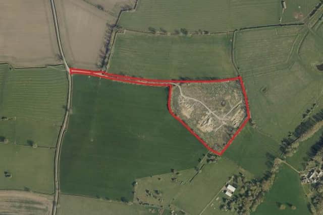 The site for the new housing scheme with Sandy Lane running down the west of the site