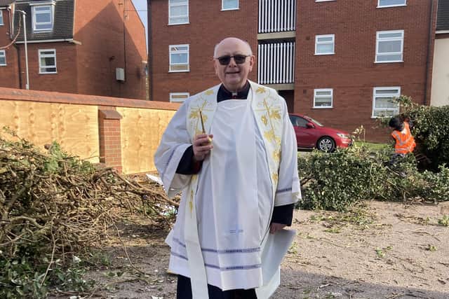 Monsignor Tom McGovern blesses the site of the community hall, which is being built next to St John The Baptist Church in Melton Mowbray