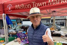 A stallholder gives the thumbs up to the new-look market