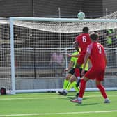 Pat Fini gets up to head home Melton's second goal on Saturday. Photo by Mark Woolterton.