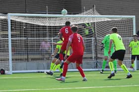 Pat Fini gets up to head home Melton's second goal on Saturday. Photo by Mark Woolterton.