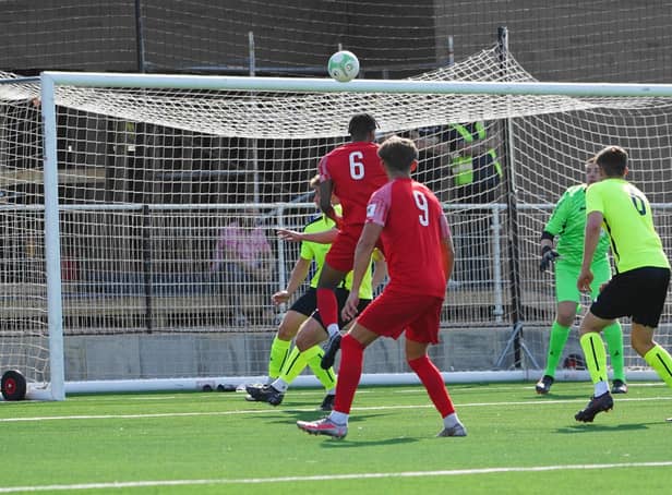 Pat Fini gets up to head home Melton's second goal on Saturday. Photo by Mark Woolterton.