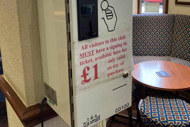 The cash machine inside the door where visitors pay £1 to get in the Legion building