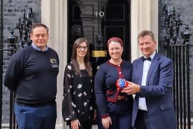 Representatives of Melton's Ye Olde Pork Pie Shoppe outside 10 Downing Street before the St George's Day reception