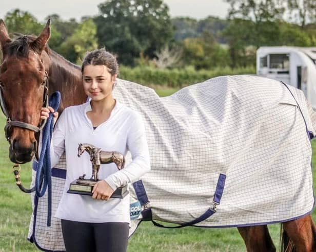 Chloé Videla celebrates her endurance race win with Charles PHOTO IndiePics Photography