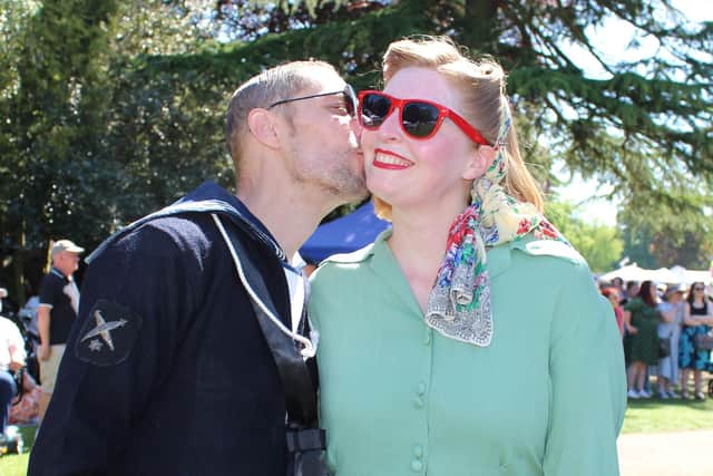 A tender moment for a couple who were dancing near the Bandstand