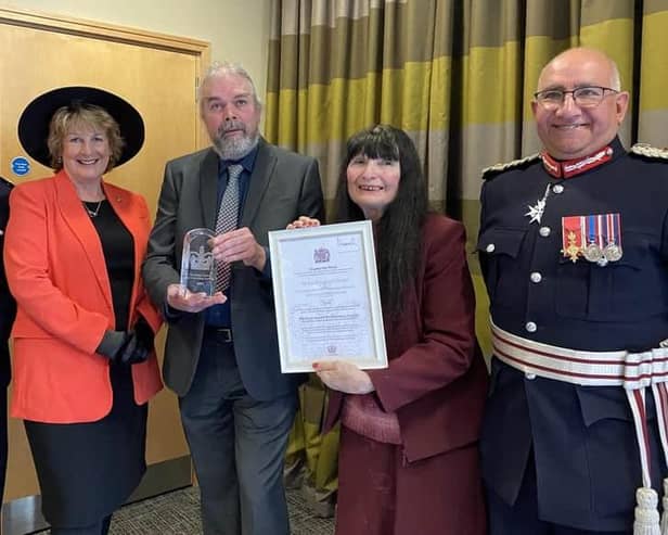 Team members from 103 The Eye pictured being presented with their King's Award in March