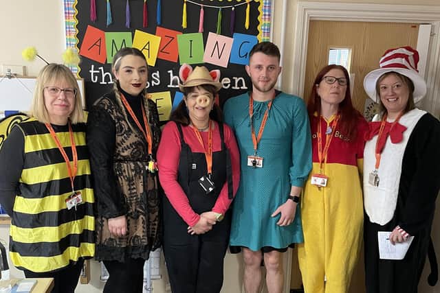 Some of the adult get dressed up for World Book Day at Brownlow Primary School
