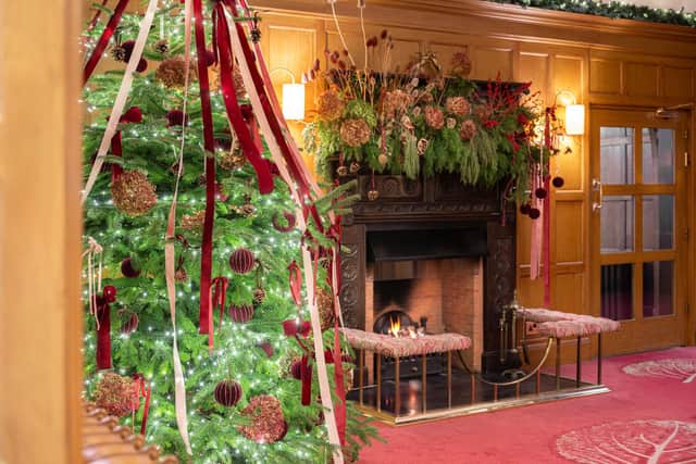 The stunning reception, with a mantel of dried flowers and fresh foliage from the gardens...
