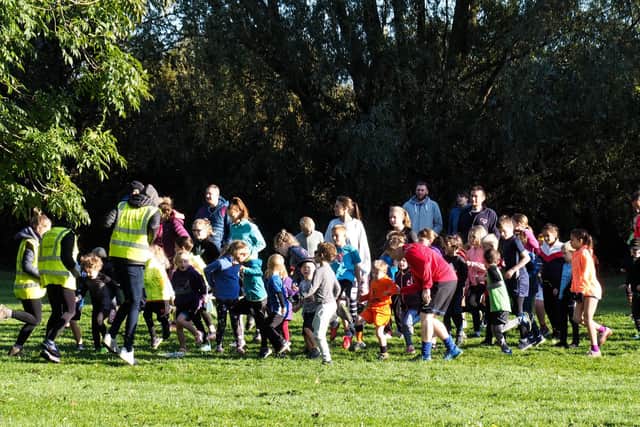 Youngsters warm up for a recent junior parkrun event in Melton