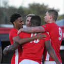 Melton celebrate a goal against Shirebrook on Saturday.