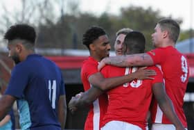 Melton celebrate a goal against Shirebrook on Saturday.