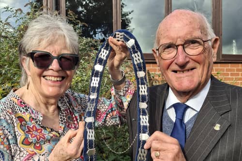 New Melton Mowbray Townwarden Ian Neale takes the chain of office from Adrienne Holland, who previously had the role