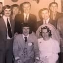 Jonny and Susannah Garland on their wedding day in April 1974 with some of his football team-mates