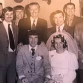 Jonny and Susannah Garland on their wedding day in April 1974 with some of his football team-mates