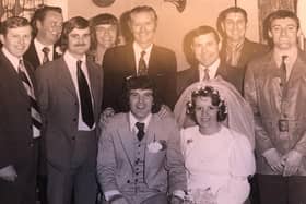 Jonny and Susannah Garland on their wedding day in April 1974 with some of his football team-mates