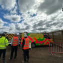 Representative from the Lighthouse Club charity offer advice to workers at the Dandara construction site at Wymeswold